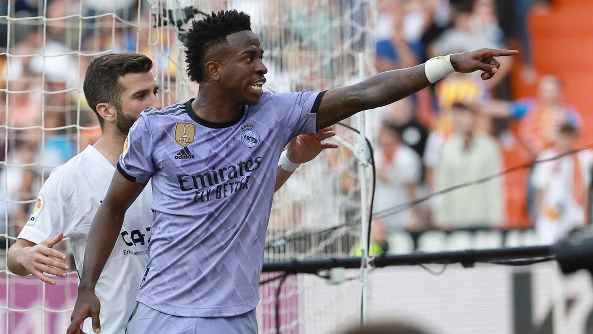 Pemain Real Madrid Vinicius Junior jadi korban serangan rasialisme dari fans Valencia (Foto: AFP via Getty Images/JOSE JORDAN)