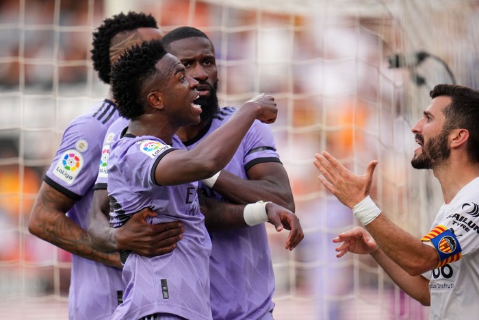 VALENCIA, SPAIN - MAY 21: Vinicius Junior of Real Madrid reacts after receiving Racist abuse via gestures made by fans during the LaLiga Santander match between Valencia CF and Real Madrid CF at Estadio Mestalla on May 21, 2023 in Valencia, Spain. (Photo by Aitor Alcalde/Getty Images)