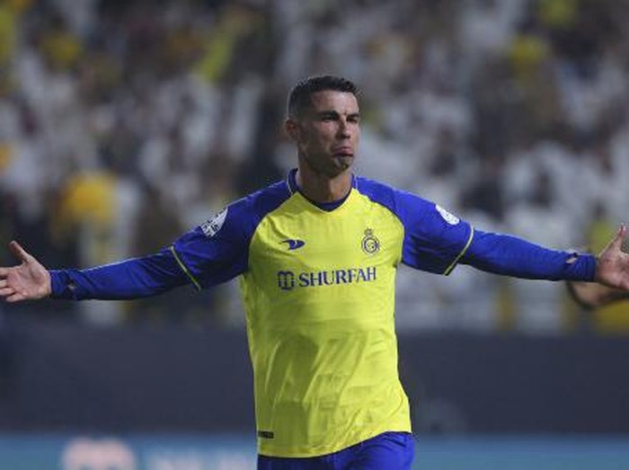 Nassr's Portuguese forward Cristiano Ronaldo reacts after scoring during the Saudi Pro League football match between Al-Nassr and Al-Shabab at the al-Awwal Park Stadium in Riyadh on May 23, 2023. (Photo by Fayez NURELDINE / AFP)