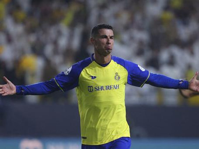 Nassr's Portuguese forward Cristiano Ronaldo reacts after scoring during the Saudi Pro League football match between Al-Nassr and Al-Shabab at the al-Awwal Park Stadium in Riyadh on May 23, 2023. (Photo by Fayez NURELDINE / AFP)
