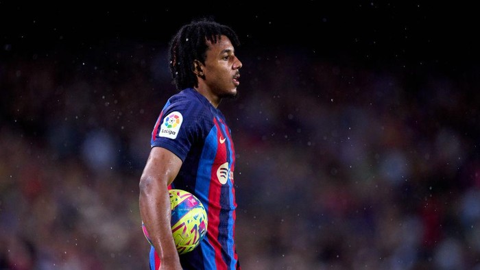 BARCELONA, SPAIN - APRIL 29: Jules Kounde of FC Barcelona carries the ball as he looks on during the LaLiga Santander match between FC Barcelona and Real Betis at Spotify Camp Nou on April 29, 2023 in Barcelona, Spain. (Photo by Alex Caparros/Getty Images)