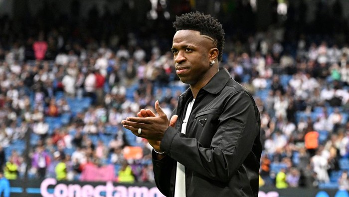 Real Madrids Brazilian forward Vinicius Junior greets the audience prior the Spanish league football match between Real Madrid CF and Rayo Vallecano de Madrid at the Santiago Bernabeu stadium in Madrid on May 24, 2023. Vinicius drew global support after making a stand against racist abuse he received on May 21 from Valencia supporters at their Mestalla stadium. (Photo by JAVIER SORIANO / AFP) (Photo by JAVIER SORIANO/AFP via Getty Images)