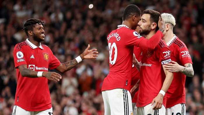 Manchester United MANCHESTER, ENGLAND - MAY 25: Bruno Fernandes of Manchester United celebrates with Fred and Marcus Rashford after scoring the team's third goal during the Premier League match between Manchester United and Chelsea FC at Old Trafford on May 25, 2023 in Manchester, England. (Photo by Catherine Ivill/Getty Images)