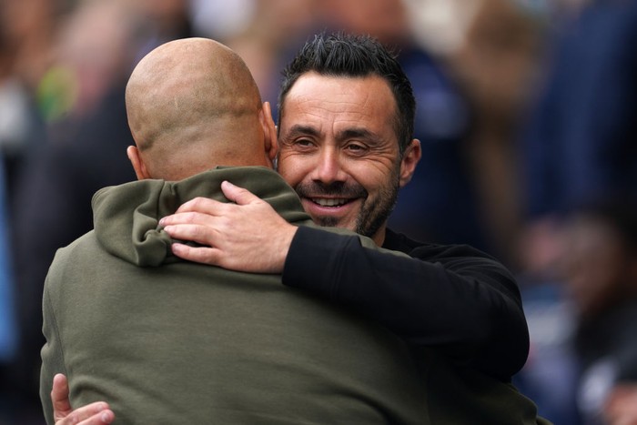 Brighton and Hove Albion manager Roberto De Zerbi (right) and Manchester City manager Pep Guardiola during the Premier League match at the Etihad Stadium, Manchester. Picture date: Saturday October 22, 2022. (Photo by Nick Potts/PA Images via Getty Images)