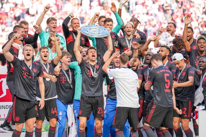 Bayern Munich COLOGNE, GERMANY - MAY 27: Daley Blind of FC Bayern Munchen, Matthijs de Ligt of FC Bayern Munchen, Josip Stanisic of FC Bayern Munchen, Thomas Muller of FC Bayern Munchen, Manuel Neuer of FC Bayern Munchen and Joshua Kimmich of FC Bayern Munchen celebrate becoming Bundeliga champions with their team mates after the Bundesliga match between 1. FC Koln and FC Bayern Munchen at the RheinEnergieStadion on May 27, 2023 in Cologne, Germany (Photo by Rene Nijhuis/BSR Agency/Getty Images)