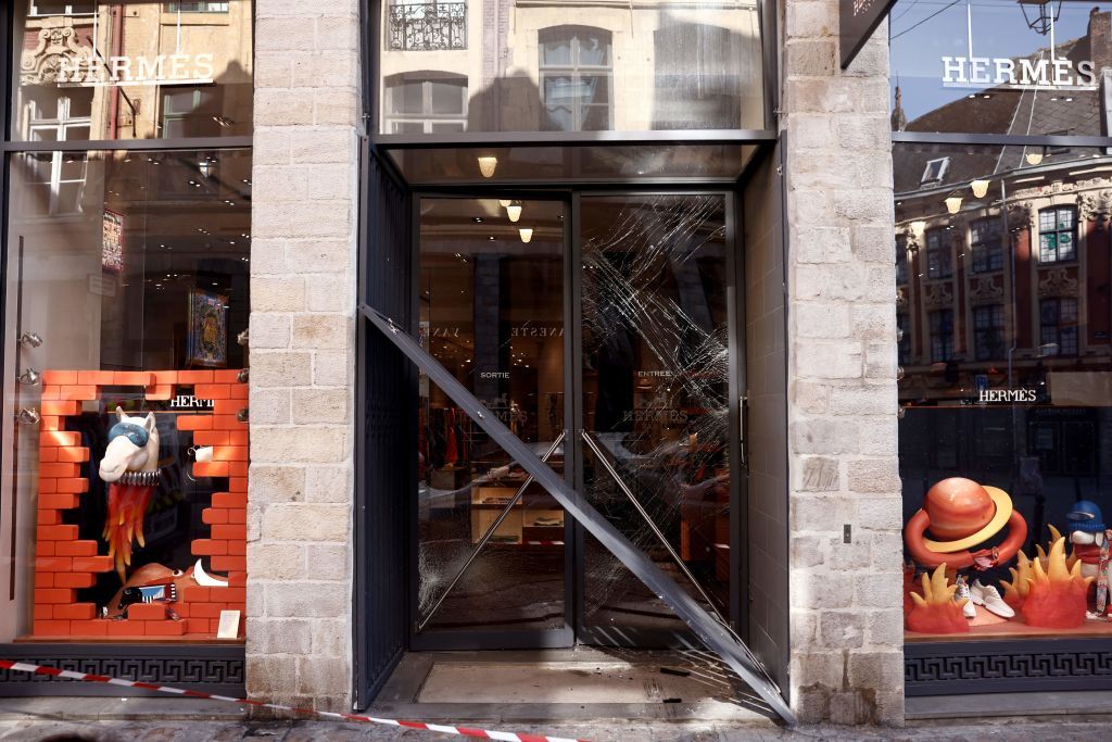 This photograph taken on May 25, 2023 in Lille shows the outside of the Hermes luxury store on the prestigious rue Grande-Chaussee where robbers used a car to ram the security gate and gain entry into the store. On May 17, 2023 the Louis-Vuitton luxury store a few streets away was attacked using the same method. (Photo by Sameer Al-Doumy / AFP) (Photo by SAMEER AL-DOUMY/AFP via Getty Images)