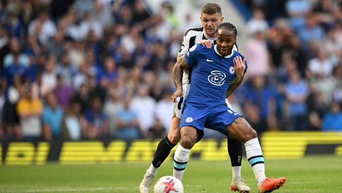 Chelseas English midfielder Raheem Sterling (front) fights for the ball with Newcastle Uniteds English defender Kieran Trippier (rear) during the English Premier League football match between Chelsea and Newcastle United at Stamford Bridge in London on May 28, 2023. (Photo by JUSTIN TALLIS / AFP) / RESTRICTED TO EDITORIAL USE. No use with unauthorized audio, video, data, fixture lists, club/league logos or live services. Online in-match use limited to 120 images. An additional 40 images may be used in extra time. No video emulation. Social media in-match use limited to 120 images. An additional 40 images may be used in extra time. No use in betting publications, games or single club/league/player publications. /  (Photo by JUSTIN TALLIS/AFP via Getty Images)