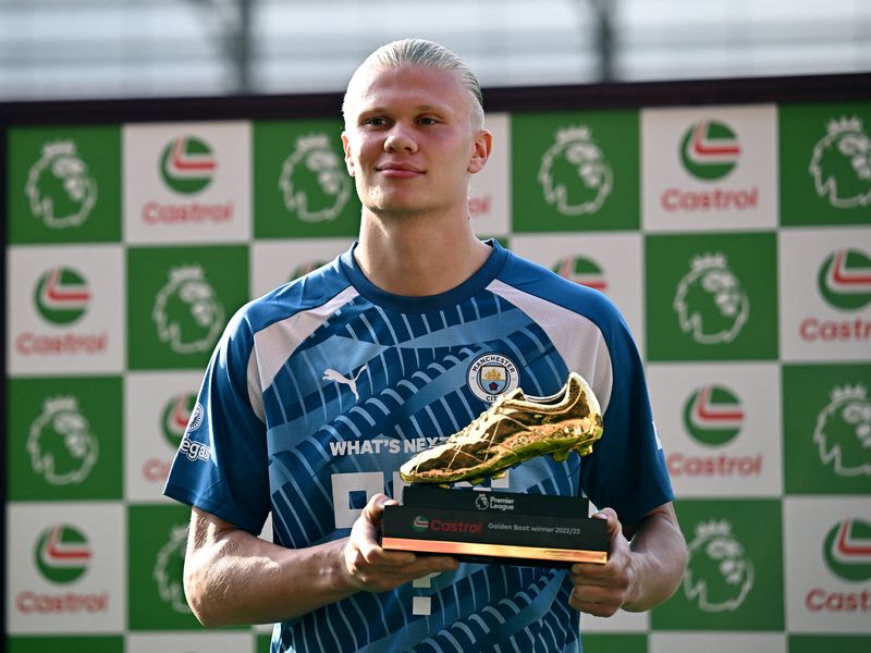 Soccer Football - Premier League - Brentford v Manchester City - Brentford Community Stadium, London, Britain - May 28, 2023 Manchester City's Erling Braut Haaland celebrates with the golden boot after the match REUTERS/Dylan Martinez EDITORIAL USE ONLY. No use with unauthorized audio, video, data, fixture lists, club/league logos or 'live' services. Online in-match use limited to 75 images, no video emulation. No use in betting, games or single club /league/player publications.  Please contact your account representative for further details.