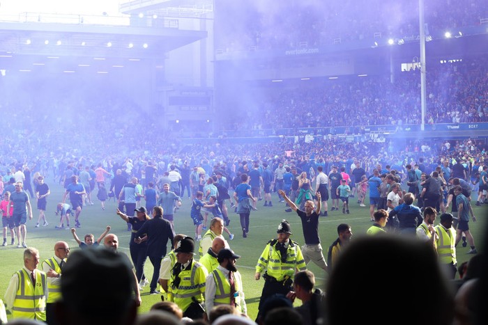 LIVERPOOL, ENGLAND - MAY 28: Everton supporters invade the pitch after the Premier League match between Everton FC and AFC Bournemouth at Goodison Park on May 28, 2023 in Liverpool, England. (Photo by James Gill - Danehouse/Getty Images)