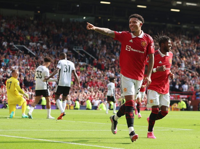 Soccer Football - Premier League - Manchester United v Fulham - Old Trafford, Manchester, Britain - May 28, 2023 Manchester Uniteds Jadon Sancho celebrates scoring their first goal REUTERS/Phil Noble EDITORIAL USE ONLY. No use with unauthorized audio, video, data, fixture lists, club/league logos or live services. Online in-match use limited to 75 images, no video emulation. No use in betting, games or single club /league/player publications.  Please contact your account representative for further details.