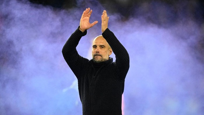 Soccer Football - Premier League - Brighton & Hove Albion v Manchester City - The American Express Community Stadium, Brighton, Britain - May 24, 2023 Manchester City manager Pep Guardiola celebrates after the match REUTERS/Toby Melville EDITORIAL USE ONLY. No use with unauthorized audio, video, data, fixture lists, club/league logos or live services. Online in-match use limited to 75 images, no video emulation. No use in betting, games or single club /league/player publications.  Please contact your account representative for further details.     TPX IMAGES OF THE DAY