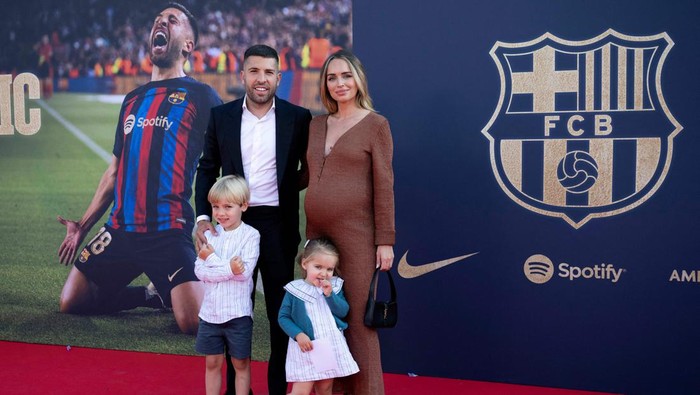 Barcelonas Spanish defender Jordi Alba poses with his wife Romarey Ventura and his children during a farewell event at the Camp Nou stadium in Barcelona on June 1, 2023. Alba departs Barcelona FC with six La Liga trophies and one Champions League triumph among other silverware. (Photo by Josep LAGO / AFP) (Photo by JOSEP LAGO/AFP via Getty Images)