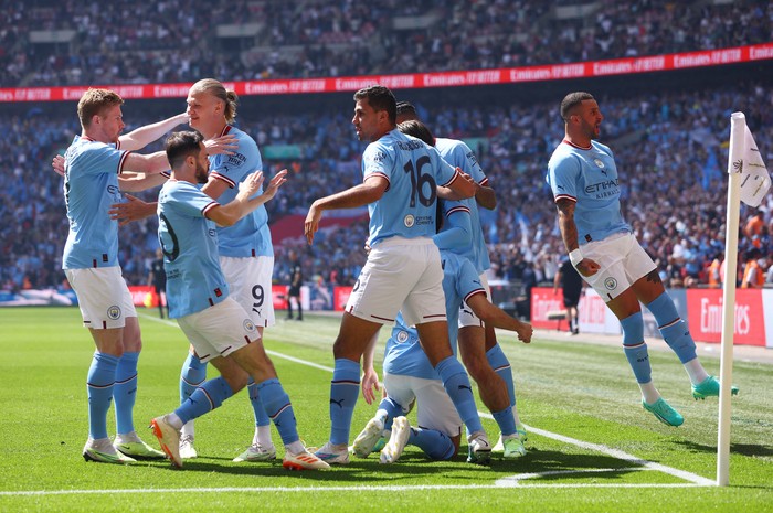 Soccer Football - FA Cup Final - Manchester City v Manchester United - Wembley Stadium, London, Britain - June 3, 2023 Manchester Citys Ilkay Gundogan celebrates scoring their first goal with Rodri, Kyle Walker and teammates Action Images via Reuters/Paul Childs