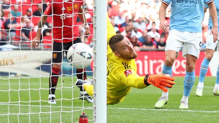LONDON, ENGLAND - JUNE 3: Manchester Uniteds David De Gea is unable to stop Manchester Citys Ilkay Gundogan scoring his sides second goal during the Emirates FA Cup Final match between Manchester City and Manchester United at Wembley Stadium on June 3, 2023 in London, England. (Photo by Marc Atkins/Getty Images)