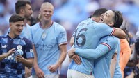 Ini adalah trofi ketujuh City di ajang sepakbola tertua dunia tersebut, atau yang pertama sejak 2019. City pun melengkapi torehan Double Winners di kompetisi domestik setelah Premier League. AP/Dave Thompson  