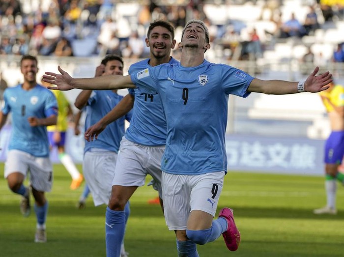 Israel's Dor Turgeman celebrates after scoring his side's third goal during the extra time of a FIFA U-20 World Cup quarterfinal soccer match against Brazil at the Bicentenario stadium in San Juan, Argentina, Saturday, June 3, 2023. (AP Photo/Ricardo Mazalan)