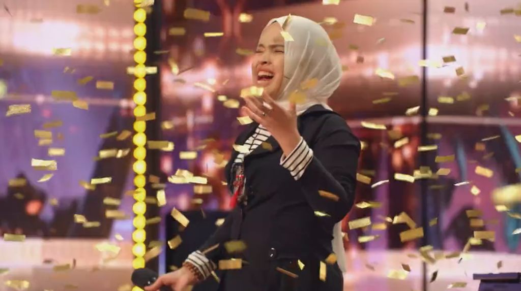 Potret Penampilan Memukau Putri Ariani yang Raih Golden Buzzer di AGT Potret Penampilan Memukau Putri Ariani yang Raih Golden Buzzer di AGT