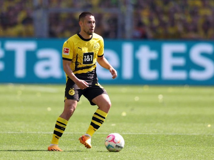 DORTMUND, GERMANY - MAY 27: Raphael Guerreiro of Dortmund runs with the ball during the Bundesliga match between Borussia Dortmund and 1. FSV Mainz 05 at Signal Iduna Park on May 27, 2023 in Dortmund, Germany. (Photo by Lars Baron/Getty Images)