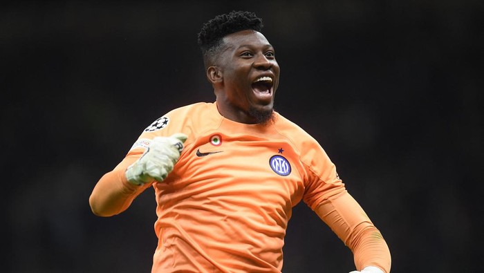 Soccer Football - Champions League - Semi Final - Second Leg - Inter Milan v AC Milan - San Siro, Milan, Italy - May 16, 2023 Inter Milans Andre Onana celebrates after Lautaro Martinez scores their first goal REUTERS/Daniele Mascolo