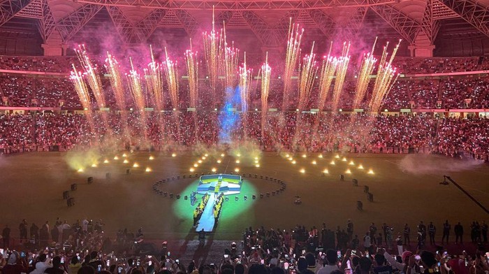 Benzema Disambut Meriah Saat Diperkenalkan Al Ittihad Fans watch fireworks at Al-Ittihad's stadium in Jeddah during a ceremony to unveil former Real Madrid striker Karim Benzema, on June 8, 2023. Benzema was unveiled as an Al-Ittihad player in front of thousands of fans in Saudi Arabia on June 8, a day after the oil-rich kingdom just failed to reel in Lionel Messi. (Photo by Haitham EL-TABEI / AFP) (Photo by HAITHAM EL-TABEI/AFP via Getty Images)