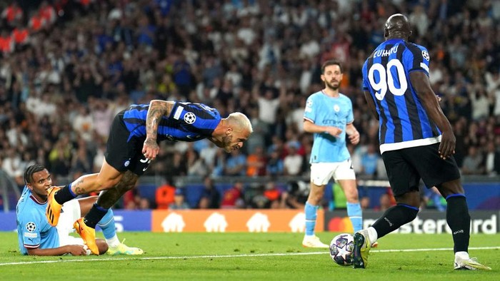 Inter Milans Federico Dimarco heads towards the goal but is blocked by team-mate Romelu Lukaku (right) during the UEFA Champions League final match at the Ataturk Olympic Stadium, Istanbul. Picture date: Saturday June 10, 2023. (Photo by Martin Rickett/PA Images via Getty Images)
