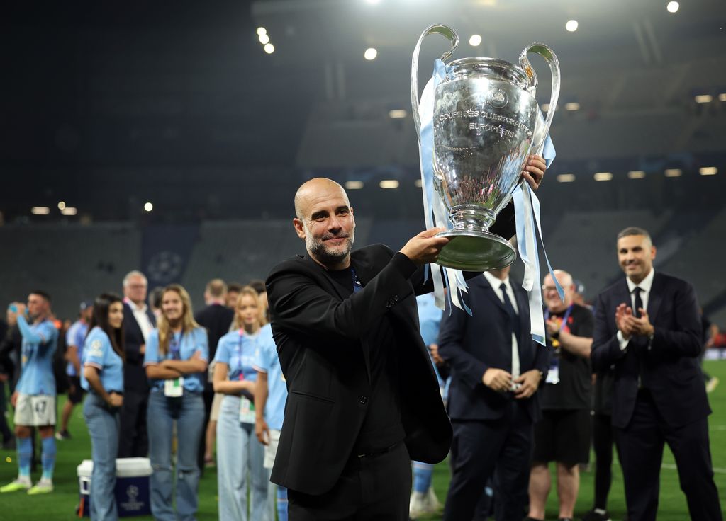 ISTANBUL, TURKEY - JUNE 10: Manchester City manager Pep Guardiola lifts the trophy during the UEFA Champions League 2022/23 final match between FC Internazionale and Manchester City FC at Atatuerk Olympic Stadium on June 10, 2023 in Istanbul, Turkey. (Photo by Ian MacNicol/Getty Images)