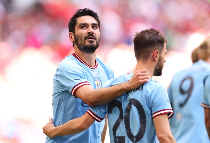 LONDON, ENGLAND - JUNE 3: Ilkay Gundogan of Manchester City celebrates with Bernardo Silva during the Emirates FA Cup Final match between Manchester City and Manchester United at Wembley Stadium on June 3, 2023 in London, England. (Photo by Marc Atkins/Getty Images)