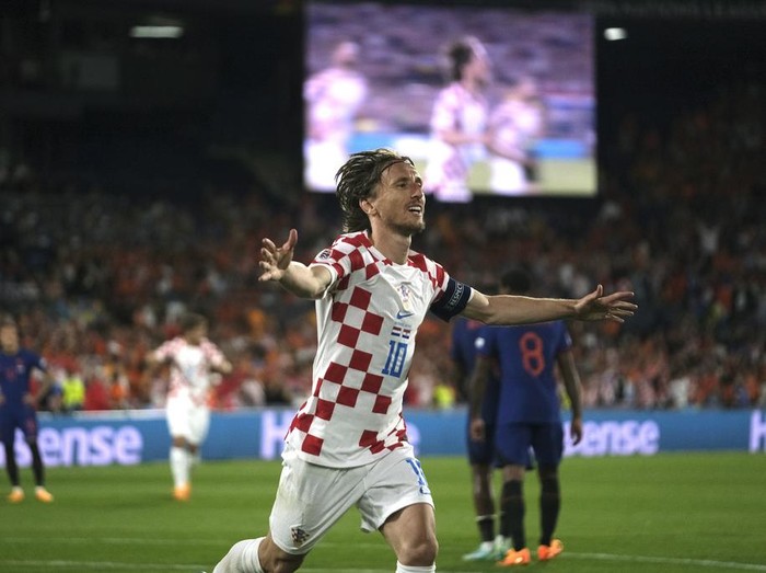 Croatia's Luka Modric celebrates after scoring his side's fourth goal against Netherlands during the Nations League semifinal soccer match between the Netherlands and Croatia at De Kuip stadium in Rotterdam, Netherlands, Wednesday, June 14, 2023. (AP Photo/Patrick Post)