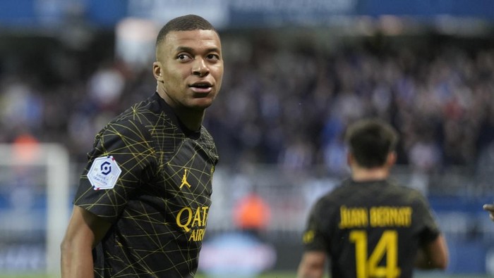 PSGs Kylian Mbappe celebrates after scoring his sides opening goal during the French League One soccer match between Troyes and Paris Saint Germain, at the Stade de lAube, in Troyes, France, Sunday, May 7, 2023. (AP Photo/Lewis Joly)