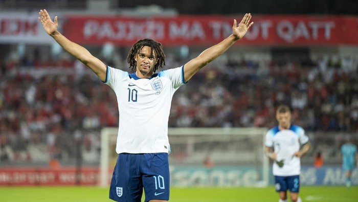 Englands Trent Alexander Arnold celebrates after scoring his sides second goal during the Euro 2024 group C qualifying soccer match between Malta and England at the National stadium in Ta Qali, near Valletta, Malta, Friday, June 16, 2023. (AP Photo/Rene Rossignaud)
