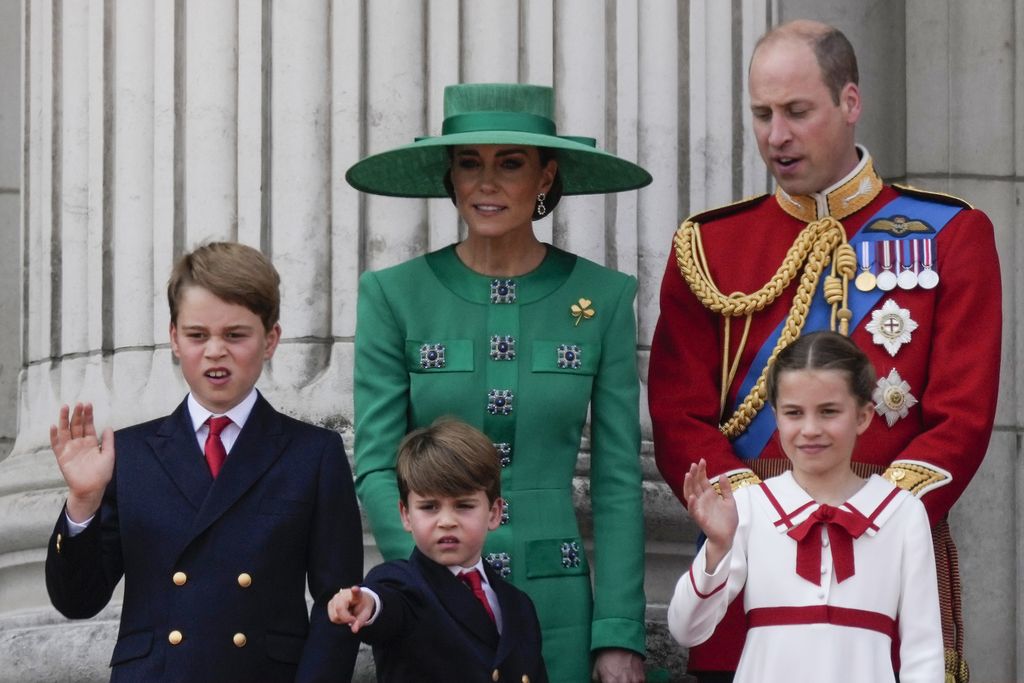 Prince William, right, Kate, Princess of Wales, centre, Princess Charlotte, bottom right, Prince George, left, and Prince Louis greet the crowd from the balcony of Buckingham Palace after the Trooping The Colour parade, in London, Saturday, June 17, 2023. Trooping the Colour is the King's Birthday Parade and one of the nation's most impressive and iconic annual events attended by almost every member of the Royal Family.(AP Photo/Alastair Grant)