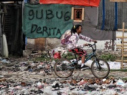 Mengefektifkan Undang-Undang Penanganan Fakir Miskin
