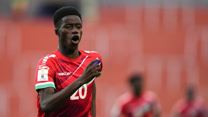 Gambias Adama Bojang celebrates scoring the opening goal against Honduras during a FIFA U-20 World Cup group F soccer match at the Malvinas Argentinas stadium in Mendoza, Argentina, Monday, May 22, 2023. (AP Photo/Natacha Pisarenko)