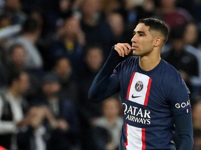 Paris Saint-Germain's Moroccan defender  Achraf Hakimi reacts after scoring his teams second goal during the French L1 football match between Paris Saint-Germain (PSG) and Ajaccio at the Parc des Princes in Paris on May 13, 2023. (Photo by FRANCK FIFE / AFP)