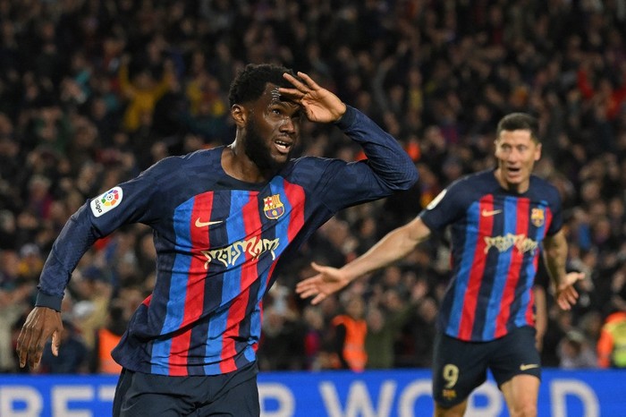 Barcelonas Ivorian midfielder Franck Kessie celebrates after scoring his teams second goal during the Spanish league football match between FC Barcelona and Real Madrid CF at the Camp Nou stadium in Barcelona on March 19, 2023. (Photo by LLUIS GENE / AFP)
