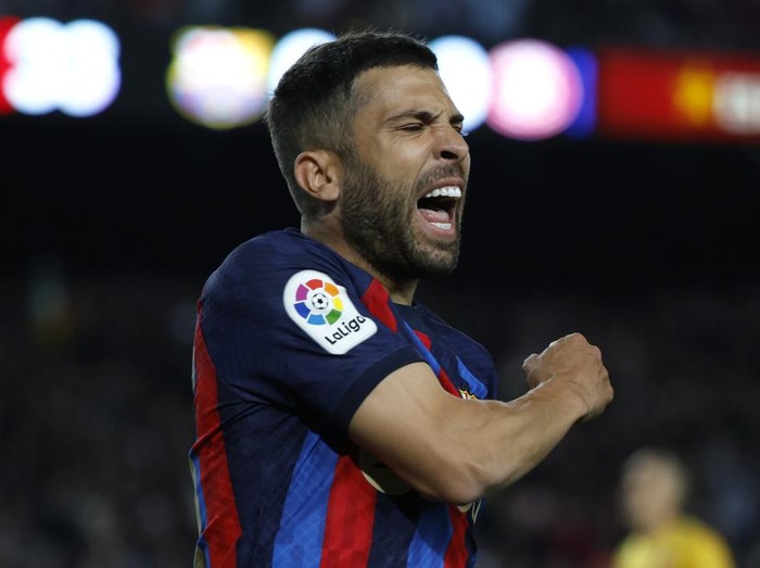 Barcelona's Jordi Alba reacts after a missed scoring opportunity during a Spanish La Liga soccer match between Barcelona and Girona at the Camp Nou stadium in Barcelona, Spain, Monday, April 10, 2023. (AP Photo/Joan Monfort)