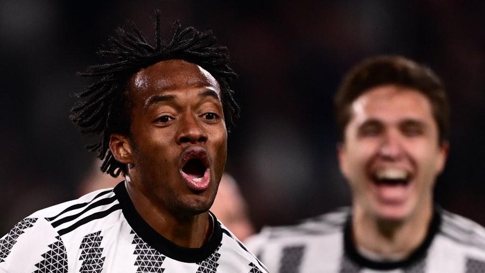 Juventus midfielder Juan Cuadrado from Colombia celebrates after scoring a goal during the Italian Cup semi-final first leg football match between Juventus and Inter Milan on April 4 2023 at the 