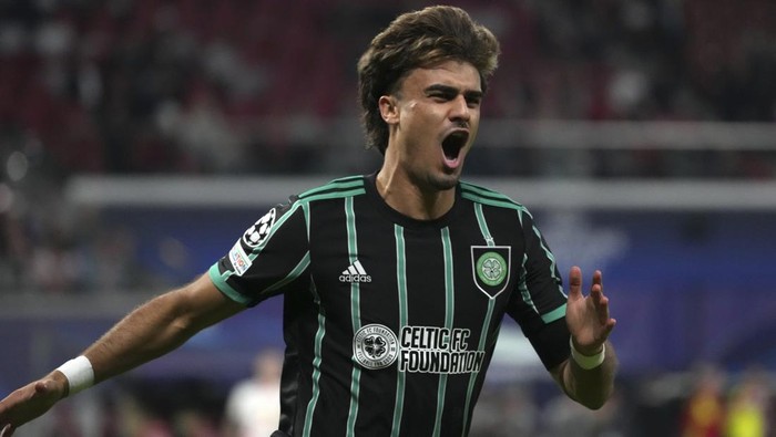 Celtics Jota celebrates after scoring his sides opening goal during the Champions League Group F soccer match between RB Leipzig and Celtic, in Leipzig, Germany, Wednesday, Oct. 5, 2022. (AP Photo/Michael Sohn)