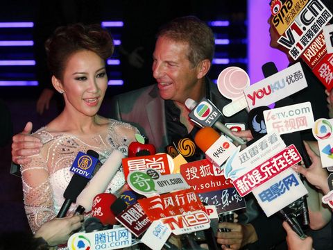 FILE - Hong Kong's pop diva Coco Lee and her husband, Bruce Rockowitz, president of Li & Fung Ltd, speak to media during their wedding banquet at Shaw Studio in Hong Kong Friday, Oct. 28, 2011. Coco Lee, a Hong Kong-born singer who had a highly successful career in Asia, died on Wednesday, July 5, 2023. She was 48. (AP Photo/Kin Cheung, File)