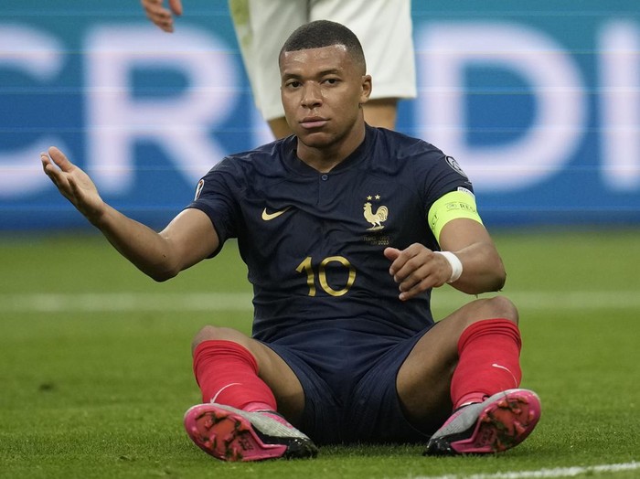 Frances Kylian Mbappe reacts during the Euro 2024 group B qualifying soccer match between France and Greece at the Stade de France, outside Paris, Monday, June 19, 2023. (AP Photo/Christophe Ena)