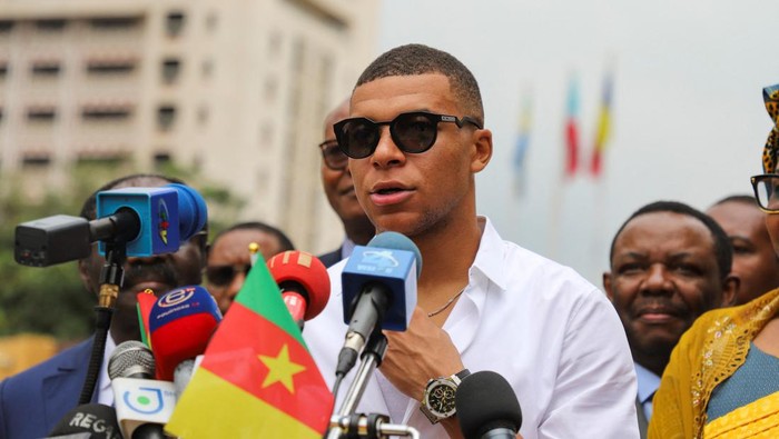 French international soccer star Kylian Mbappe gives a speech as he continues his first visit to his fathers homeland in Yaounde, Cameroon July 7, 2023. REUTERS/Desire Danga Essigue