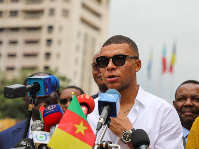 French international soccer star Kylian Mbappe gives a speech as he continues his first visit to his father's homeland in Yaounde, Cameroon July 7, 2023. REUTERS/Desire Danga Essigue