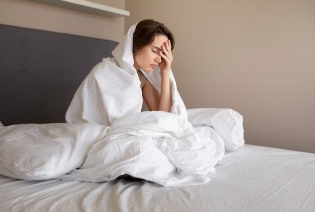 Perempuan di balik selimut