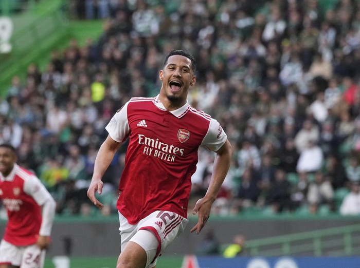 Arsenal's William Saliba celebrates after scoring his side's opening goal during the Europa League round of 16, first leg, soccer match between Sporting CP and Arsenal at the Alvalade stadium in Lisbon, Thursday, March 9, 2023. (AP Photo/Armando Franca)
