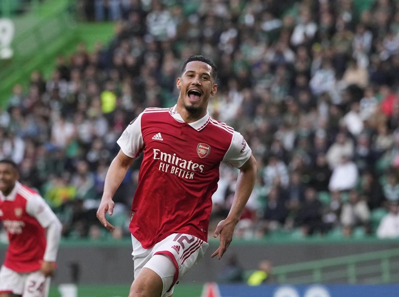 Arsenal's William Saliba celebrates after scoring his side's opening goal during the Europa League round of 16, first leg, soccer match between Sporting CP and Arsenal at the Alvalade stadium in Lisbon, Thursday, March 9, 2023. (AP Photo/Armando Franca)