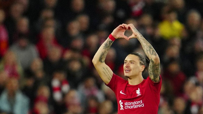 Liverpools Darwin Nunez celebrates after scoring his sides opening goal during the Champions League, round of 16, first leg soccer match between Liverpool and Real Madrid at the Anfield stadium in Liverpool, England, Tuesday, Feb. 21, 2023. (AP Photo/Jon Super)