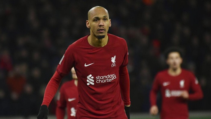 Liverpools Fabinho, left, stands on the pitch during the English FA Cup 3rd round replay soccer match between Wolverhampton Wanderers and Liverpool at Molineux stadium in Wolverhampton, England, Tuesday Jan. 17, 2023. (AP Photo/Rui Vieira)
