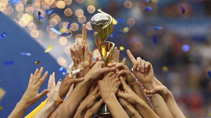 FILE - The United States players hold the trophy as they celebrate winning the Womens World Cup final soccer match against The Netherlands at the Stade de Lyon in Decines, outside Lyon, France on July 17, 2019. More prize money than ever will be awarded at this years Womens World Cup, and the players stand to get direct payments from FIFA this time. (AP Photo/Francisco Seco, File)
