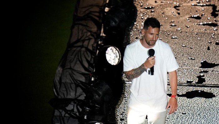 Jul 16, 2023; Ft. Lauderdale, FL, USA;  Inter Miami CF forward Lionel Messi speaks at The Unveil event and press conference on stage at DRV PNK Stadium. Mandatory Credit: Rich Storry-USA TODAY Sports