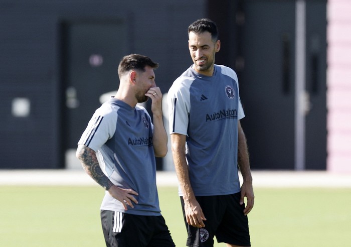 Soccer Football - MLS - Inter Miami Training - DRV PNK Stadium, Fort Lauderdale, Florida, United States - July 18, 2023 Inter Miamis Lionel Messi and Sergio Busquets during training REUTERS/Marco Bello